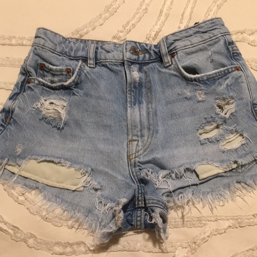 High-Rise Light Blue Distressed Denim Shorts